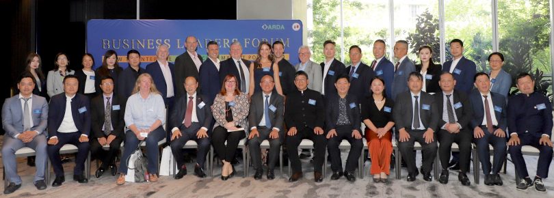 Group of people seated and standing at Business Leaders’ Forum in Canberra