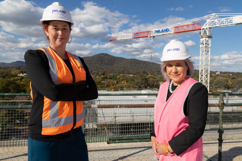 Shelley Mulherin and Grace Ferreira on building site