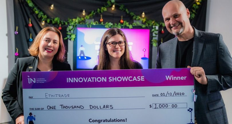 Zoe Piper presented with giant cheque from Canberra Innovation Network