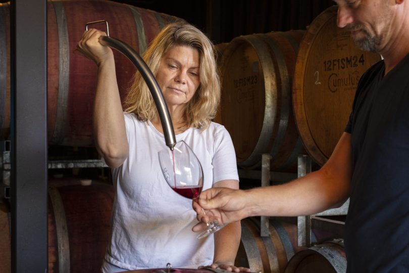 Sarah McDougall bottling wine